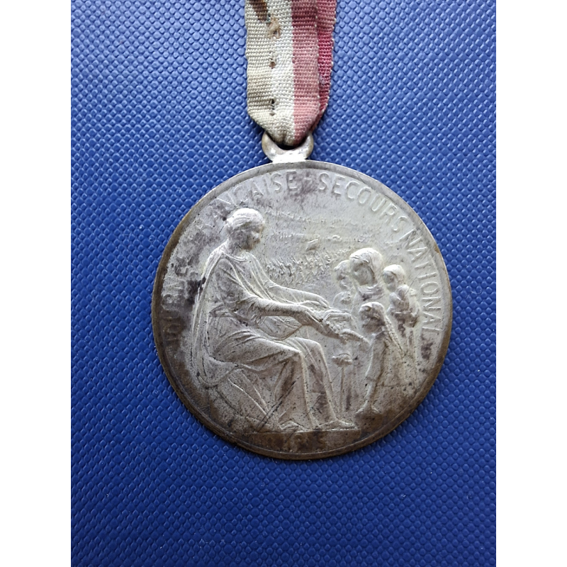 Жетон Французька національна допомога (Française Secours National) 1915 року.